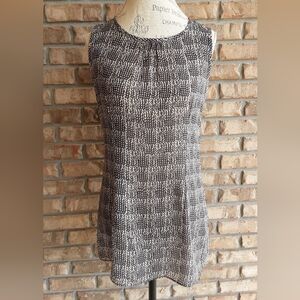 Cabi sleeveless geometric print blouse size small.